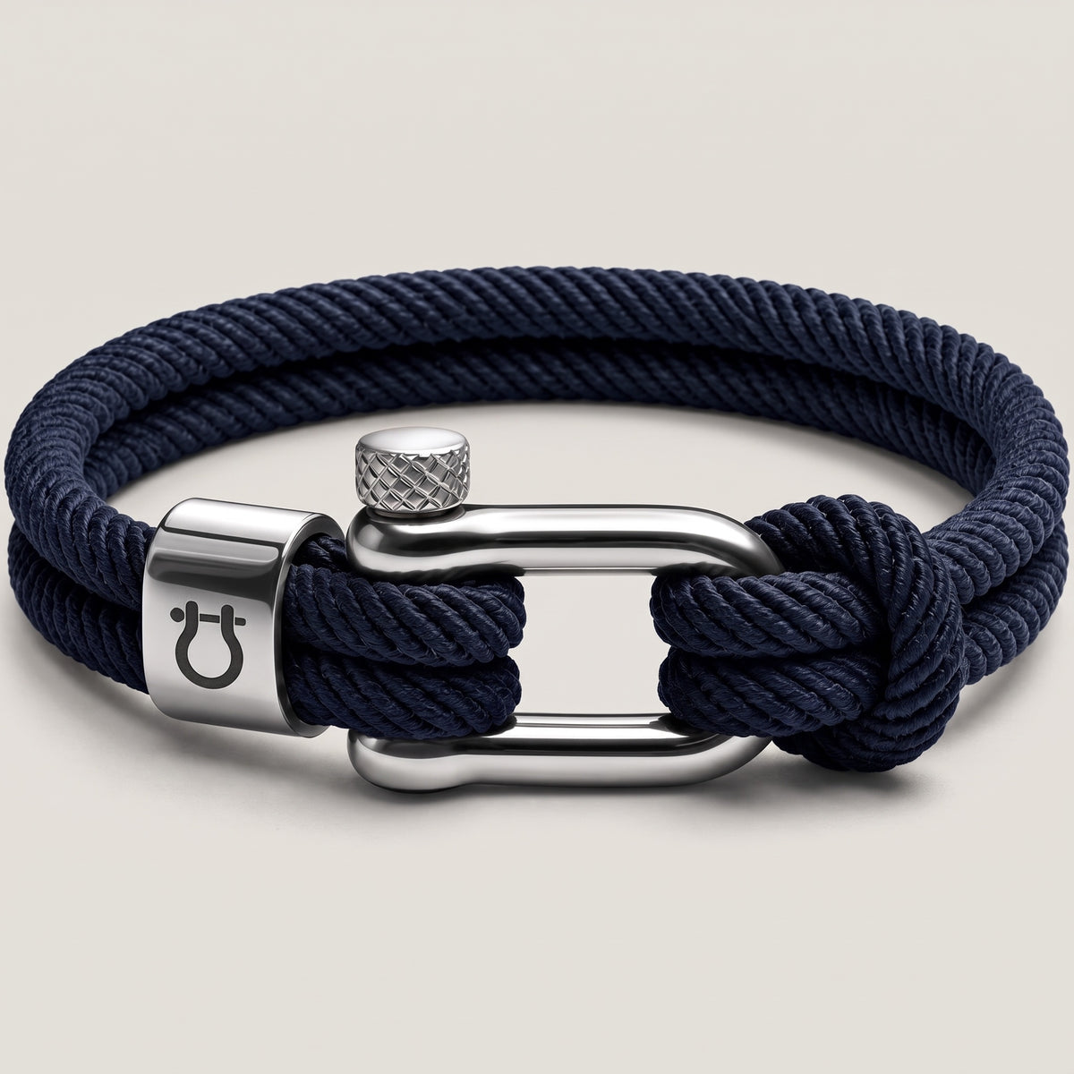 Halyard bracelet, steel shackle on navy cord